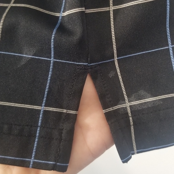 Grand Slam Polo Golf Tee. Size Medium. Black with Blue and Yellow Accents. - Picture 4 of 6